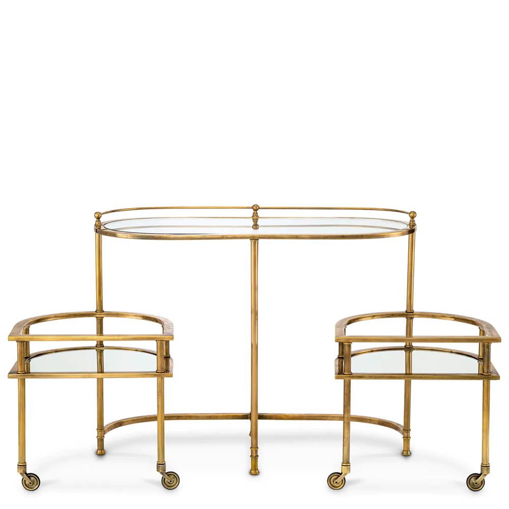 Vintage brass trolley paired with elegant mirrored glass top and clear glass layer