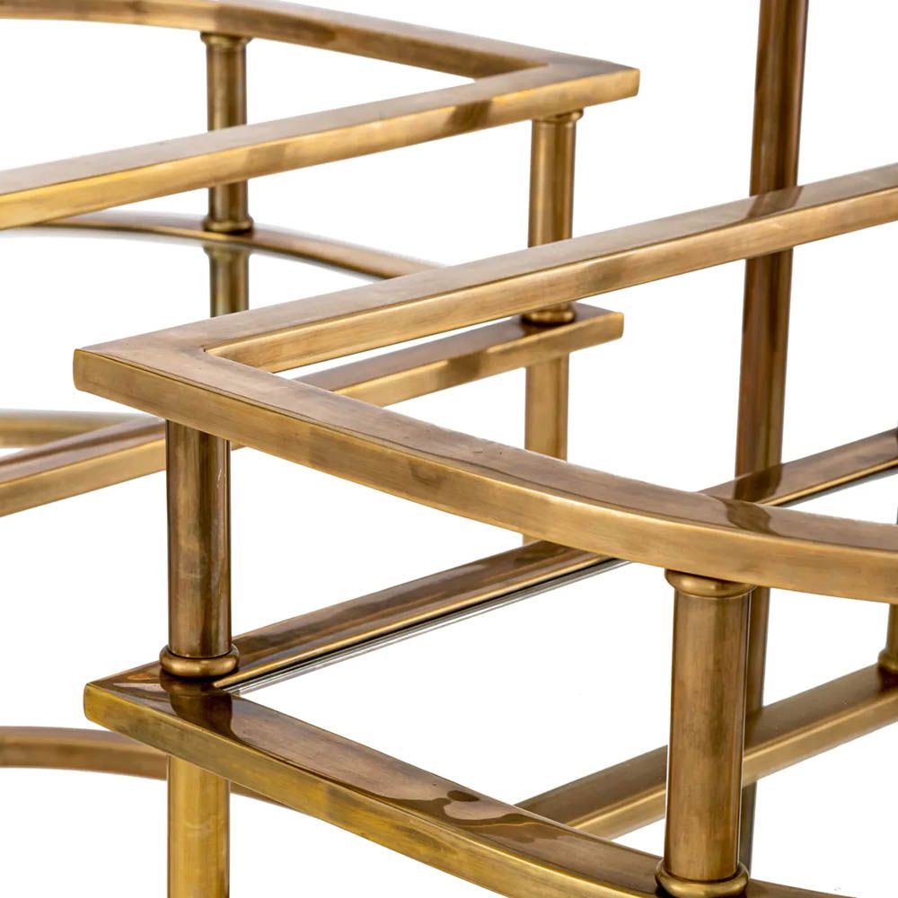 Vintage brass trolley paired with elegant mirrored glass top and clear glass layer