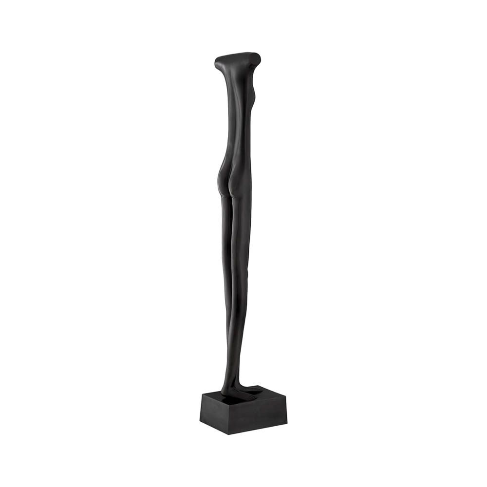 Tall headless figure in bronze finish