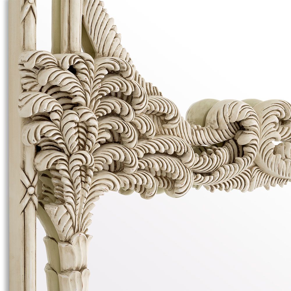 An elegant wall mirror by Eichholtz embellished with delicate leaves and blossoms with an antique white finish