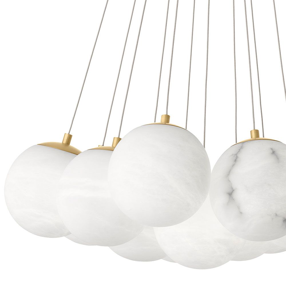Elegant chandelier featuring suspended orb design and brass plate