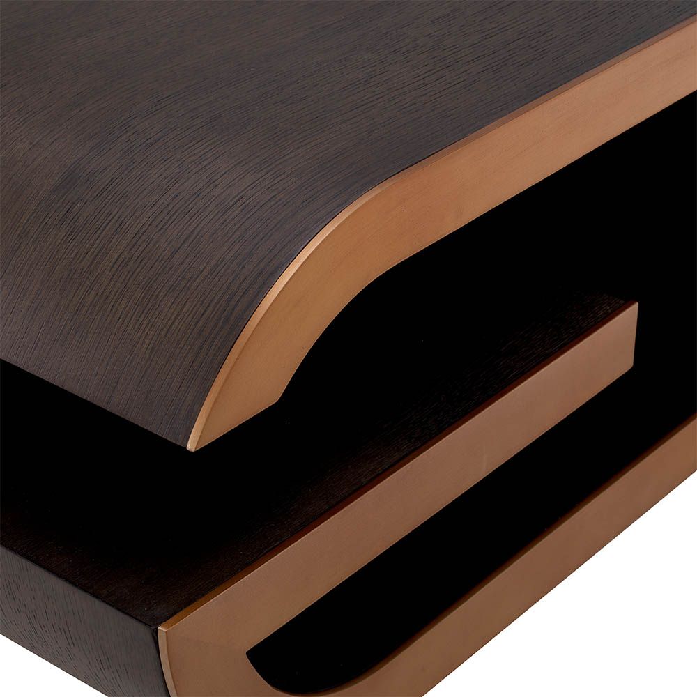 Elegant low coffee table with brass details and curved edges