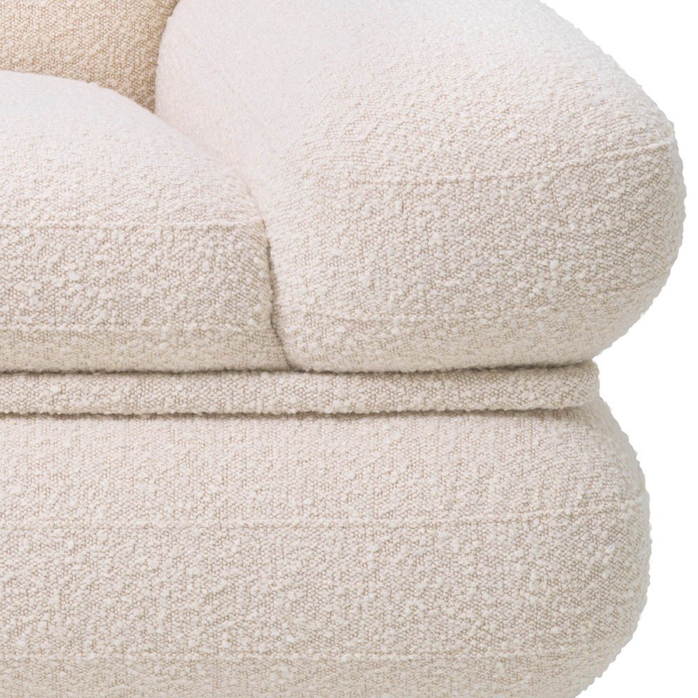 Plush, cloud-like armchair in boucle cream finish