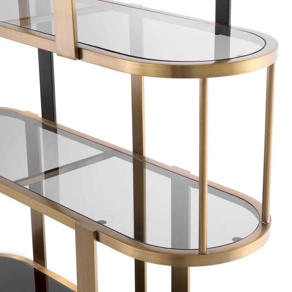 Sophisticated round display cabinet with shelving finished in brass