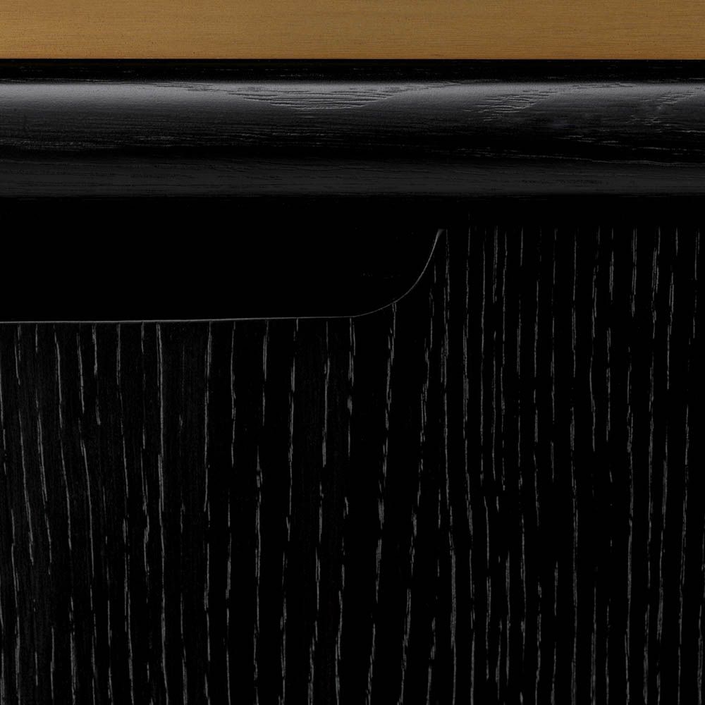 Charcoal grey bedside table with brass piping detail