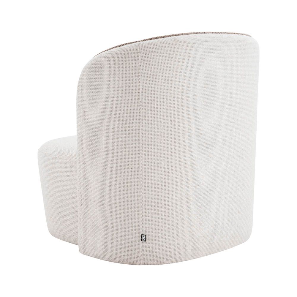 Elegant, sculptural chair with contrast piping detail