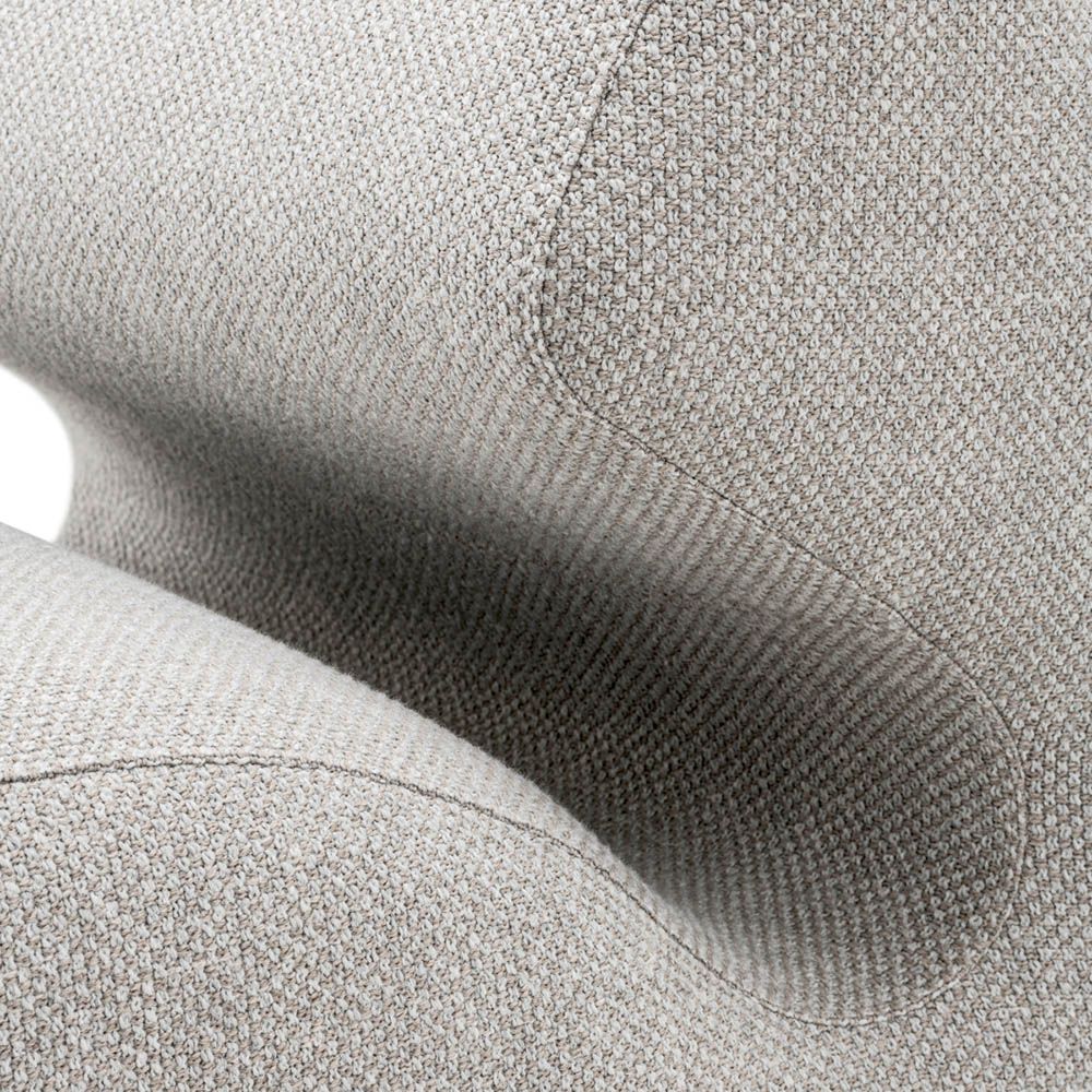 Unique lounge chair with a contemporary silhouette and grey upholstery 