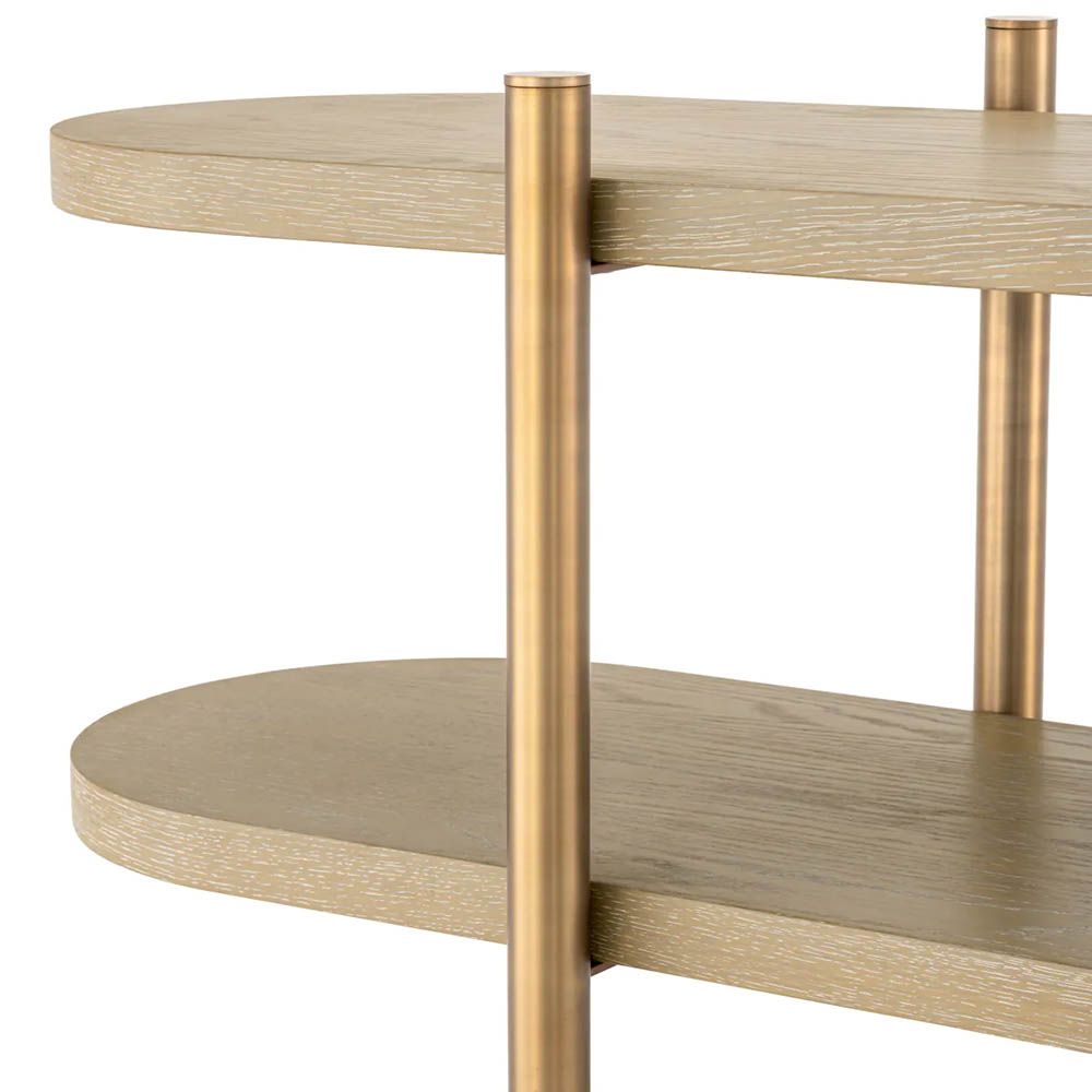 Curved and contemporary cabinet with washed oak shelves and brass legs