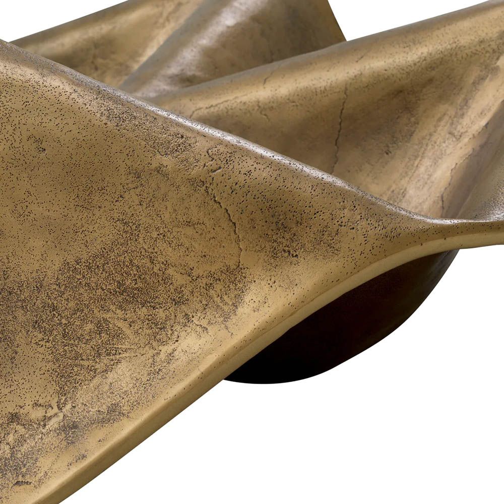 Wavey brass coffee table with glass top
