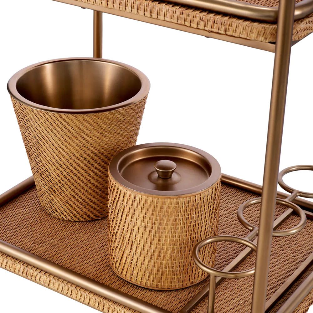 Chic trolley with vintage brass accents and natural rattan tiers