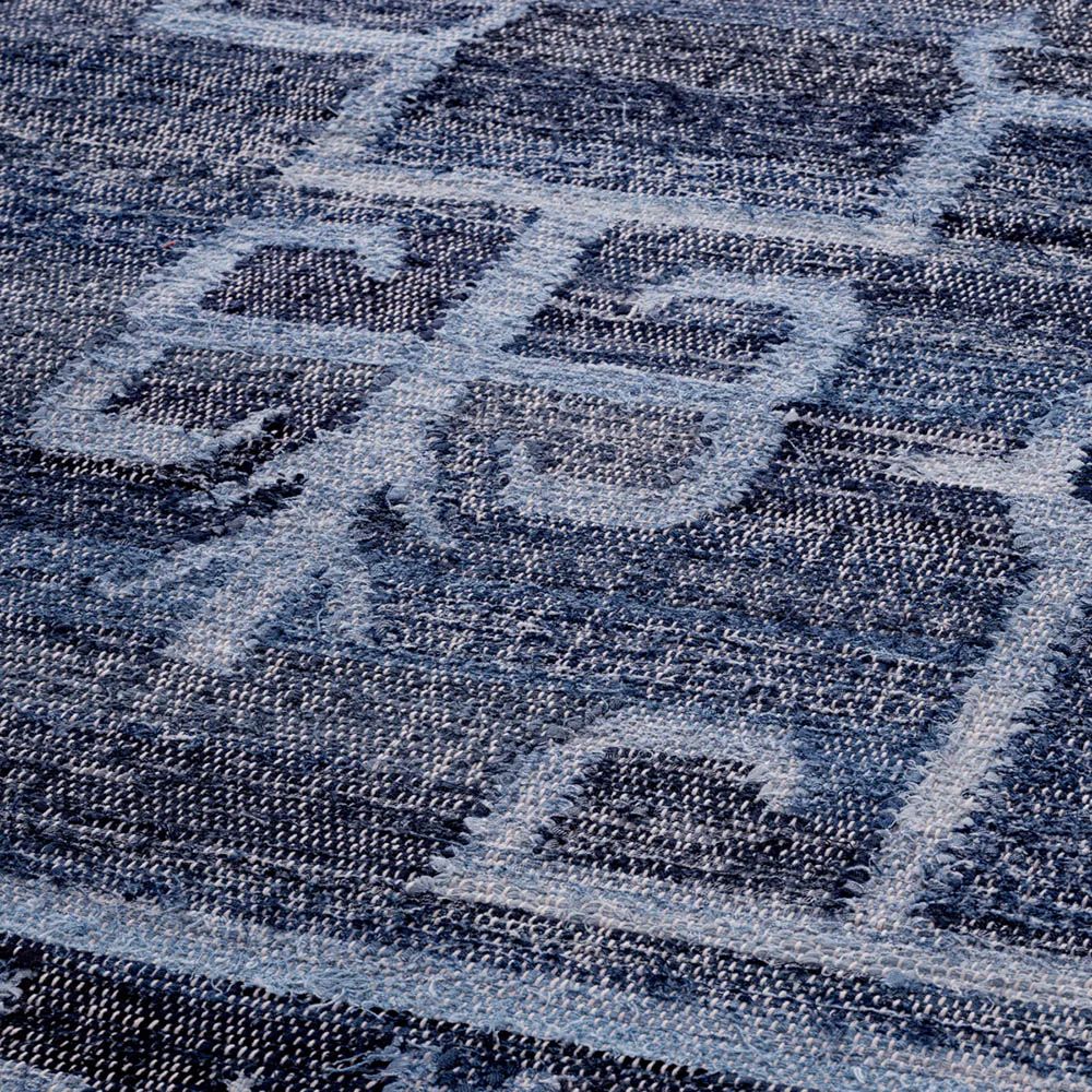 Flat woven blue rug crafted from recycled cotton denim