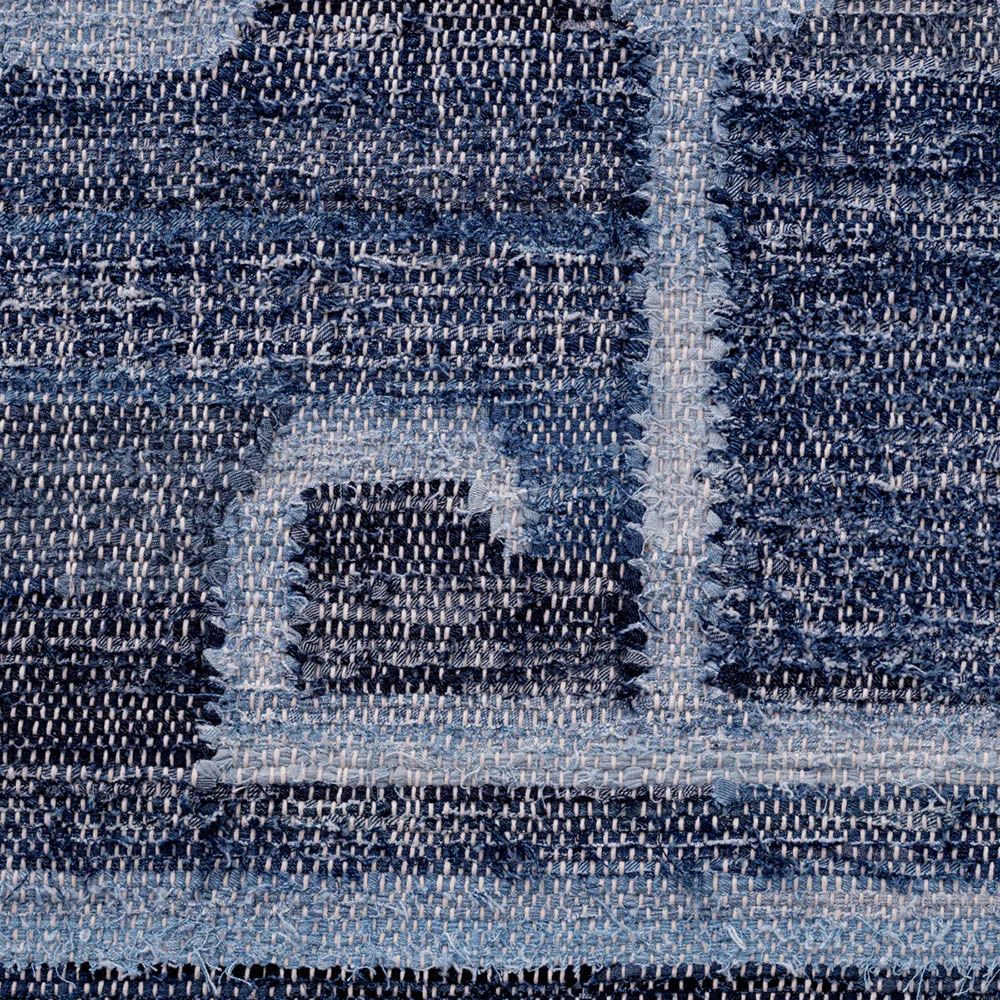 Flat woven blue rug crafted from recycled cotton denim