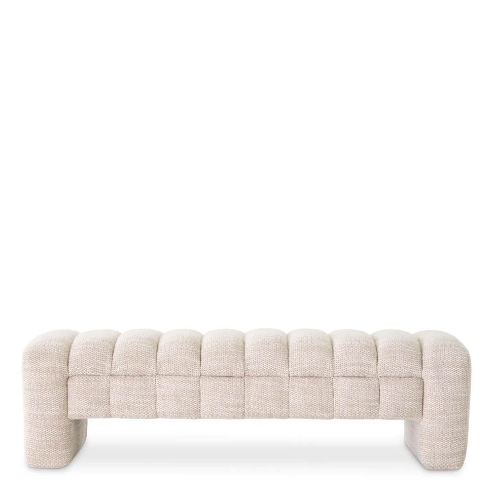 A contemporary bench by Eichholtz with a stunning sand coloured upholstery 