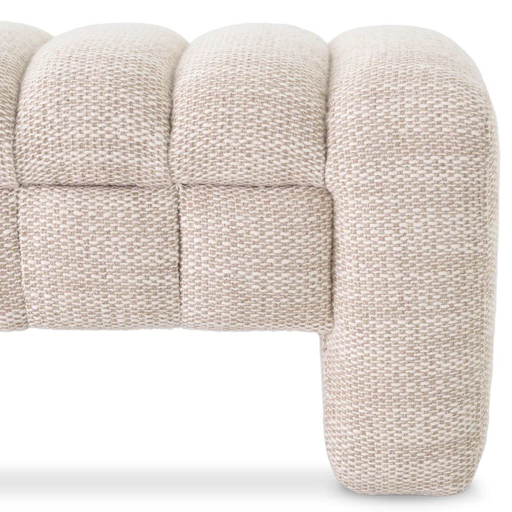 A contemporary bench by Eichholtz with a stunning sand coloured upholstery 