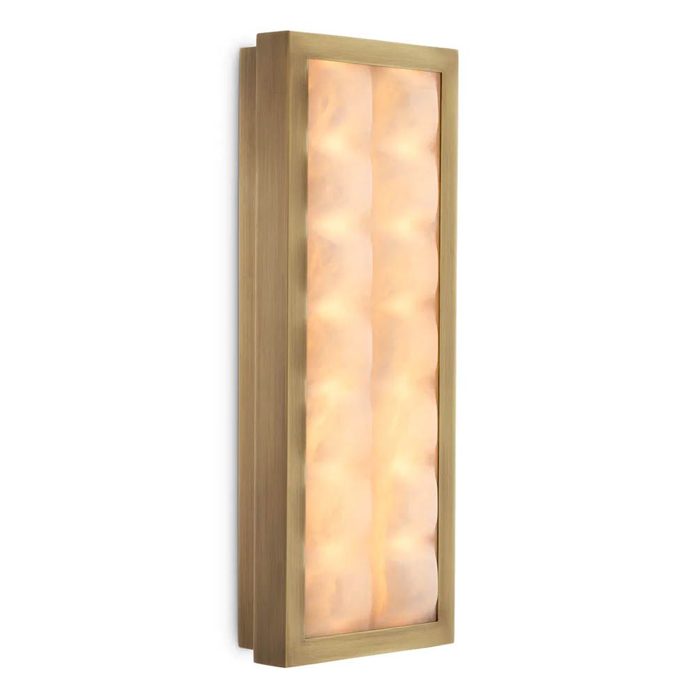 Softly quilted glass wall lamp with brass edge