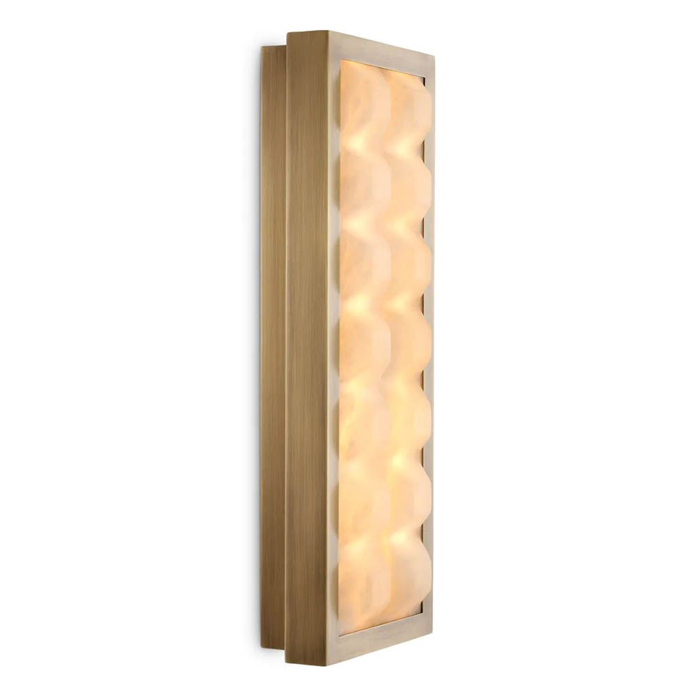 Softly quilted glass wall lamp with brass edge