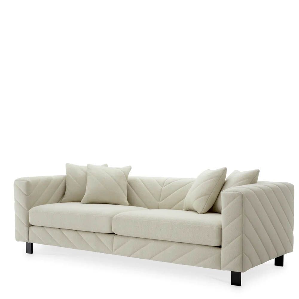Upholstered modern sofa with chevron stitching detail