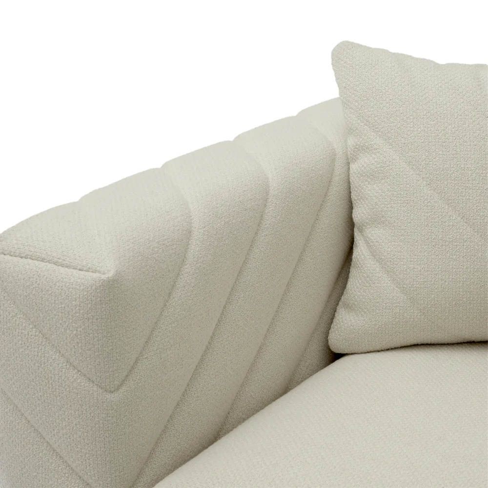 Upholstered modern sofa with chevron stitching detail