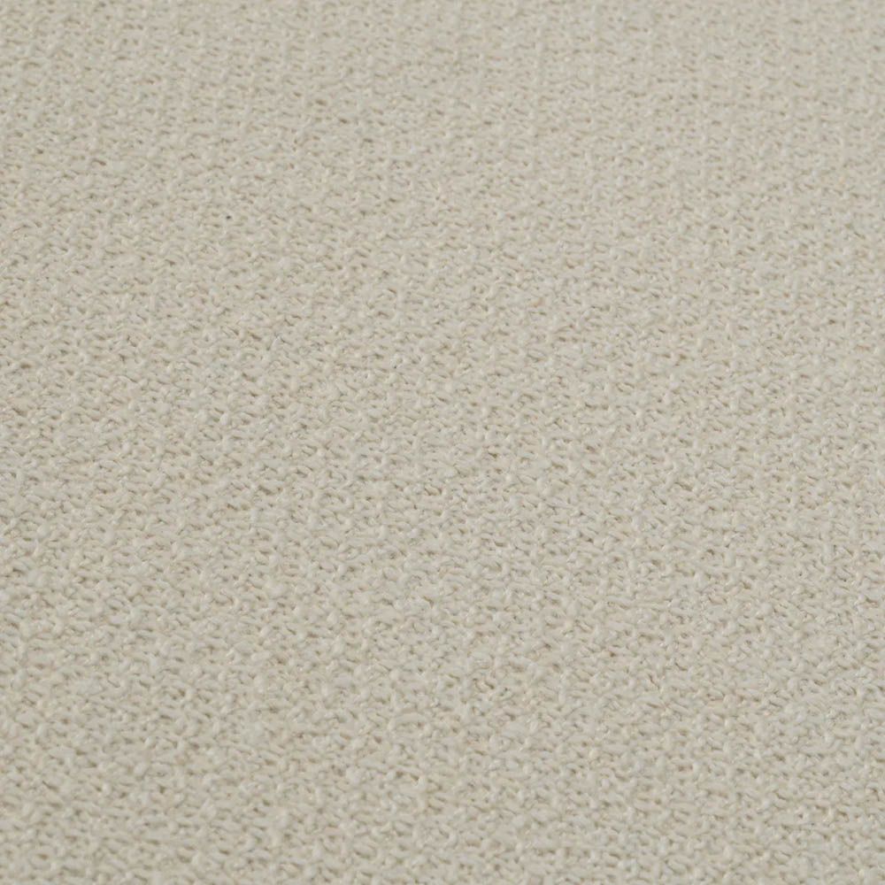 Upholstered modern armchair with chevron stitching detail in reve cream
