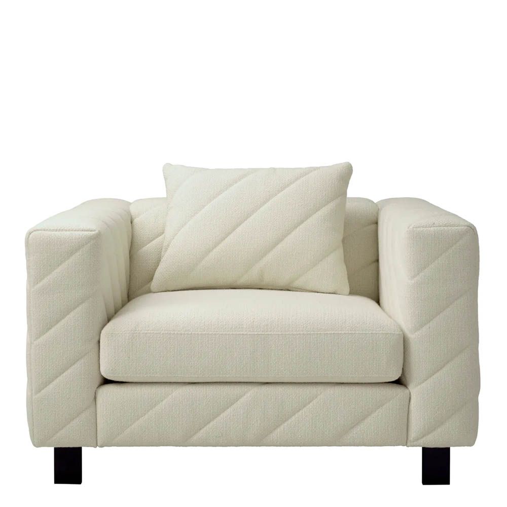 Upholstered modern armchair with chevron stitching detail in reve cream