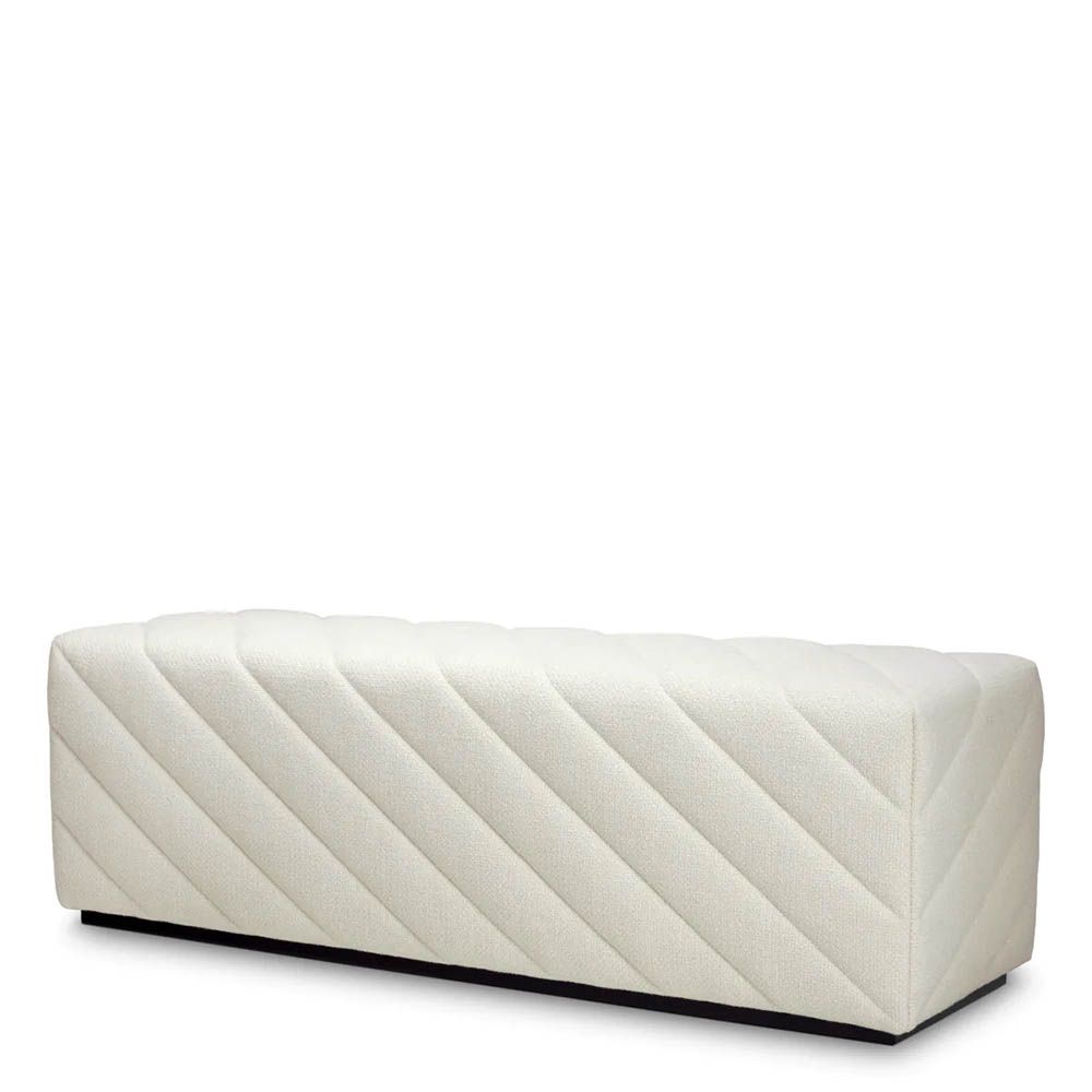 Cream upholstered modern bench with chevron stitching detail