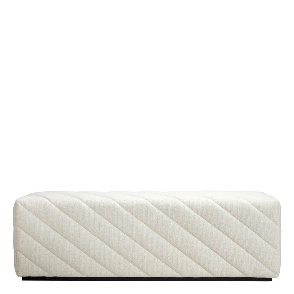 Cream upholstered modern bench with chevron stitching detail