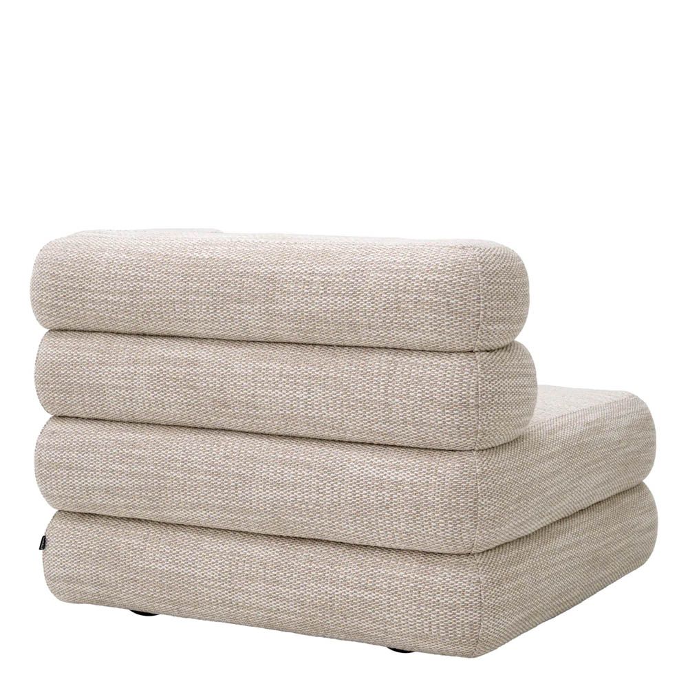 A luxury modular sofa by Eichholtz with a stunning sand coloured upholstery