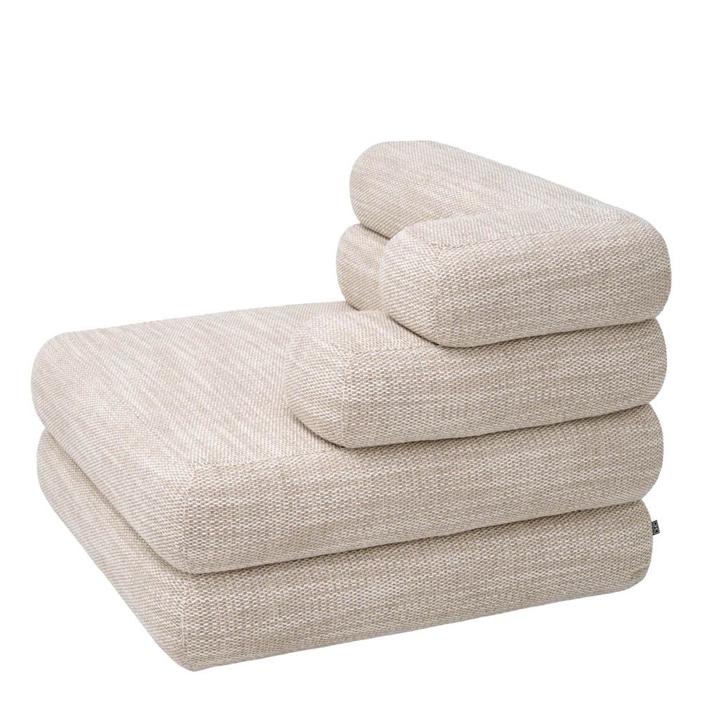 A luxury modular sofa by Eichholtz with a stunning sand coloured upholstery
