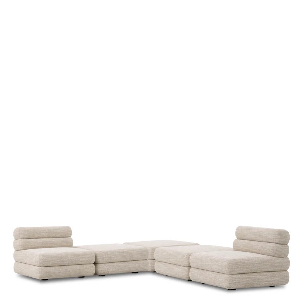 A contemporary modular sofa by Eichholtz with a sand coloured upholstery and modern design