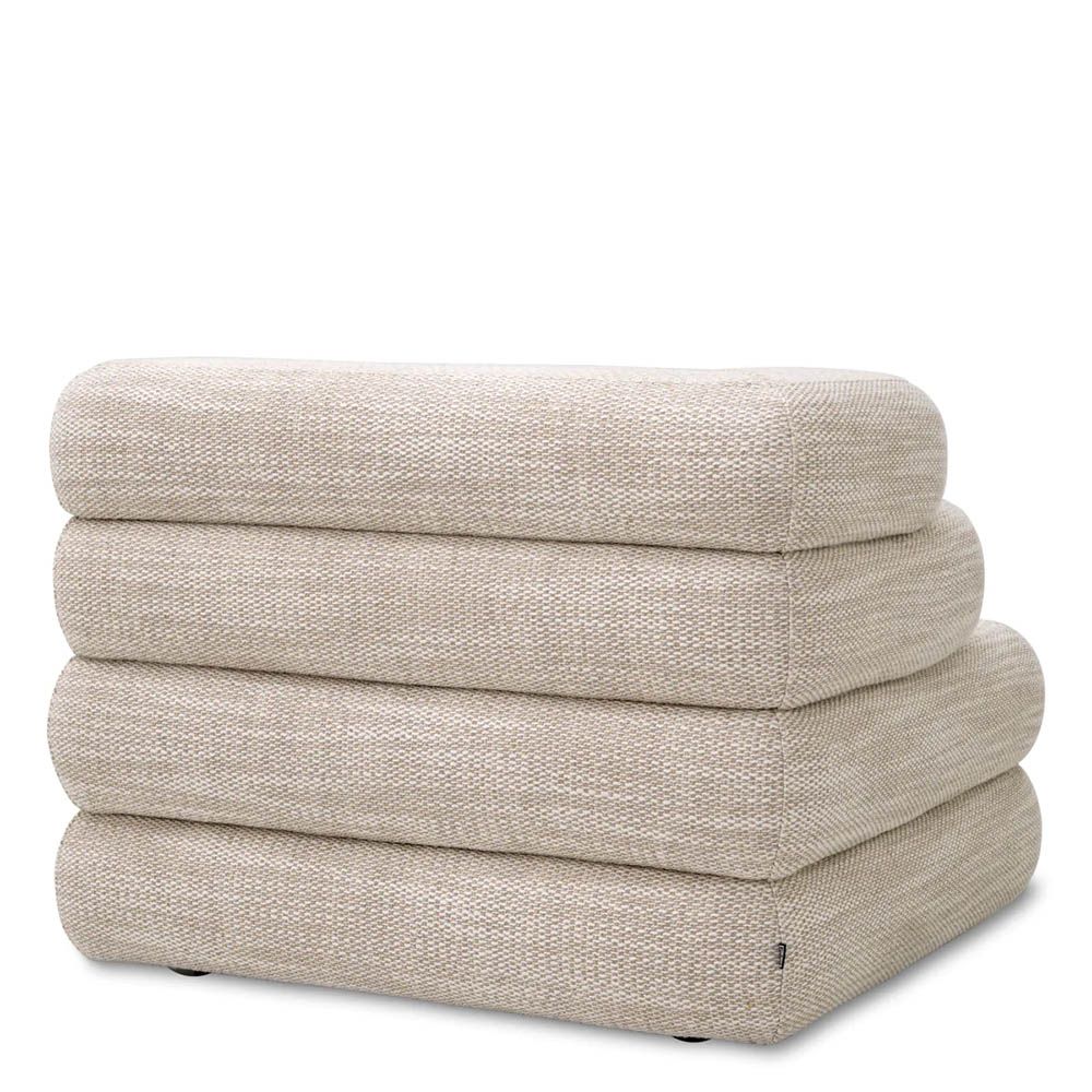 A contemporary modular sofa by Eichholtz with a sand coloured upholstery and modern design