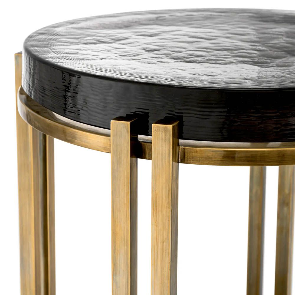 Side table featuring round, thick tabletop made from handmade vintage glass and brass finish 