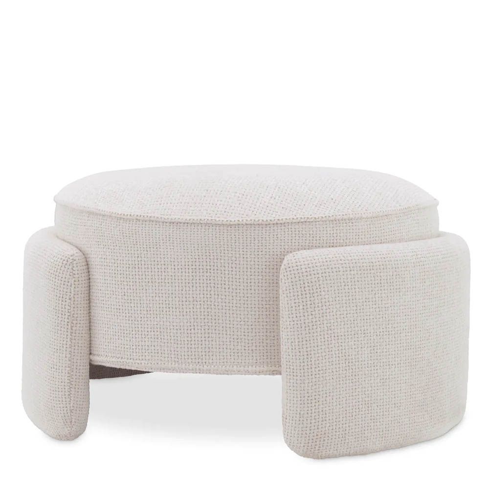 Round ottoman in lyssa off-white upholstery with wrap around legs