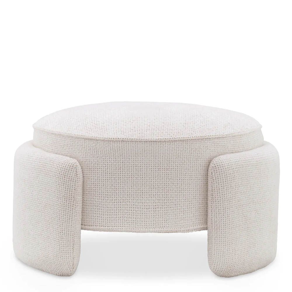 Round ottoman in lyssa off-white upholstery with wrap around legs