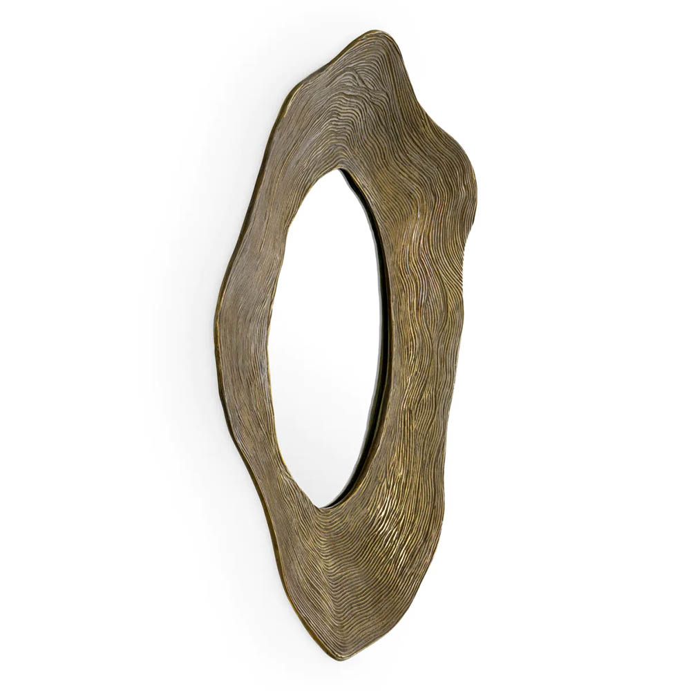 Mirror with vintage brass frame in rounded abstract design