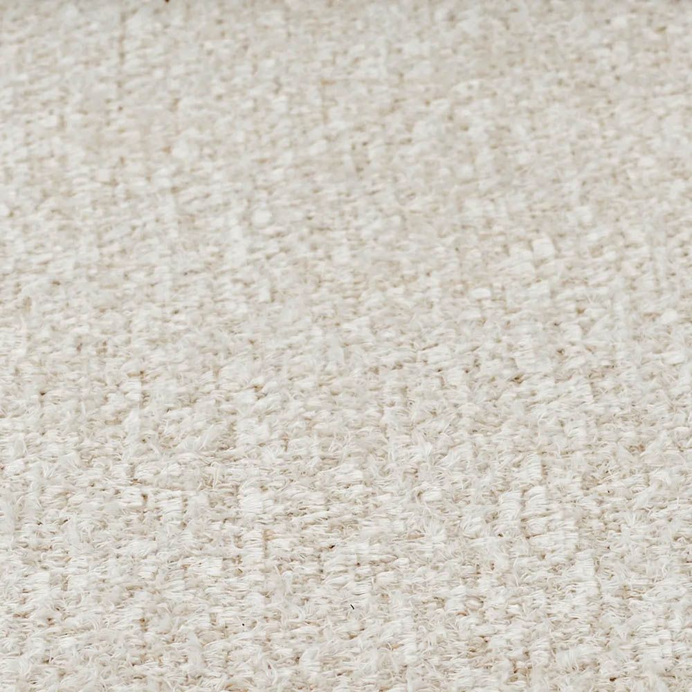 Shapely off-white upholstered headboard