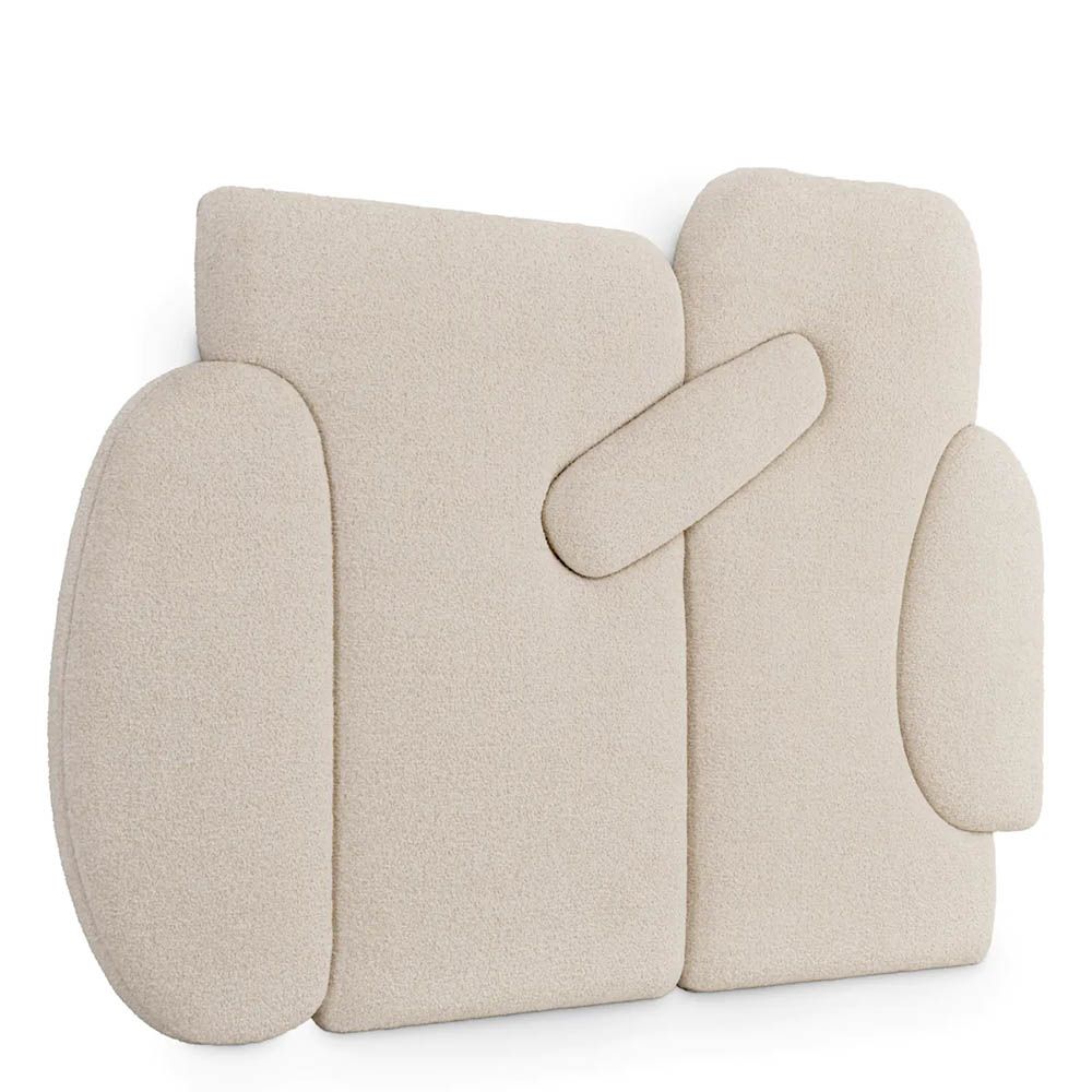 Shapely off-white upholstered headboard