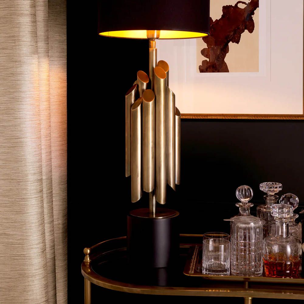 Gold clustered pipe design table lamp with black shade