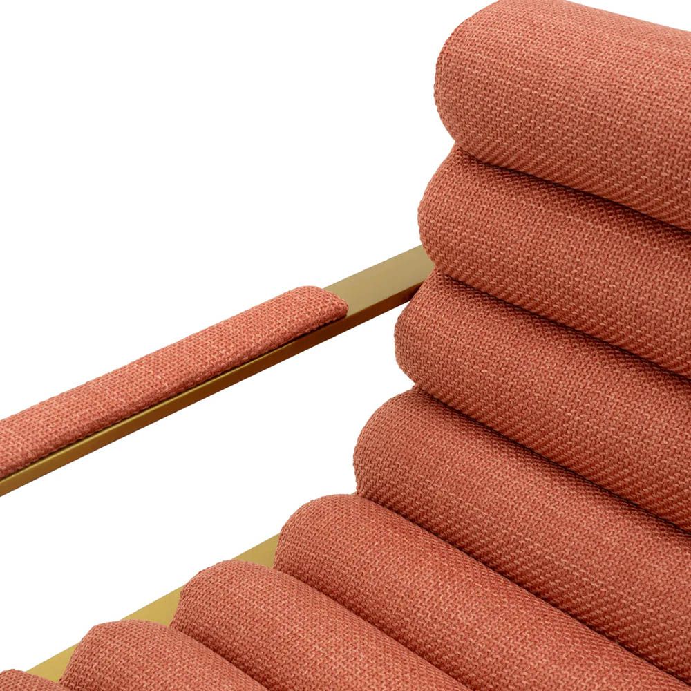 orange linen upholstered counter stool with horizontal fluting and brass frame
