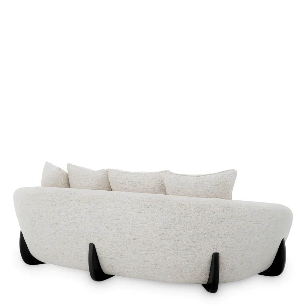 A luxury sofa by Eichholtz with a stunning grey upholstery and modern design
