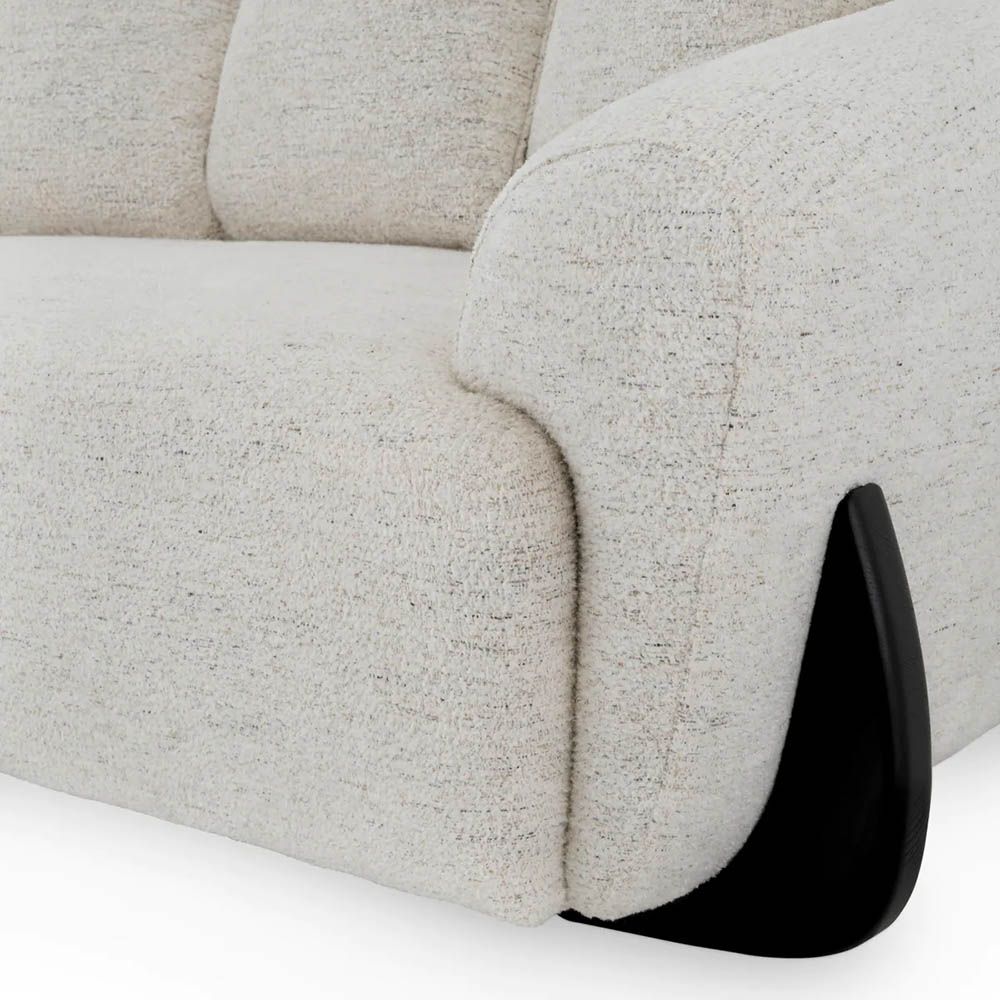 A luxury sofa by Eichholtz with a stunning grey upholstery and modern design