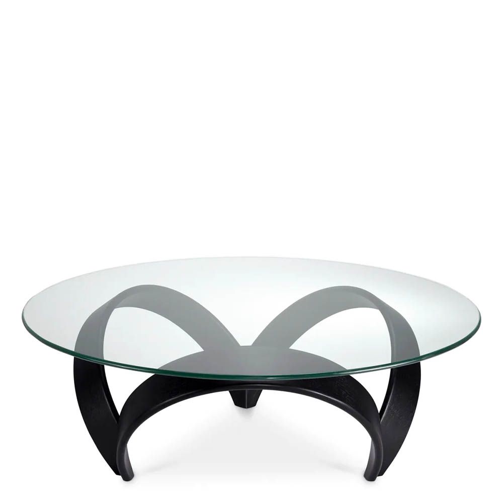Curvaceous trio legged coffee table with round glass top