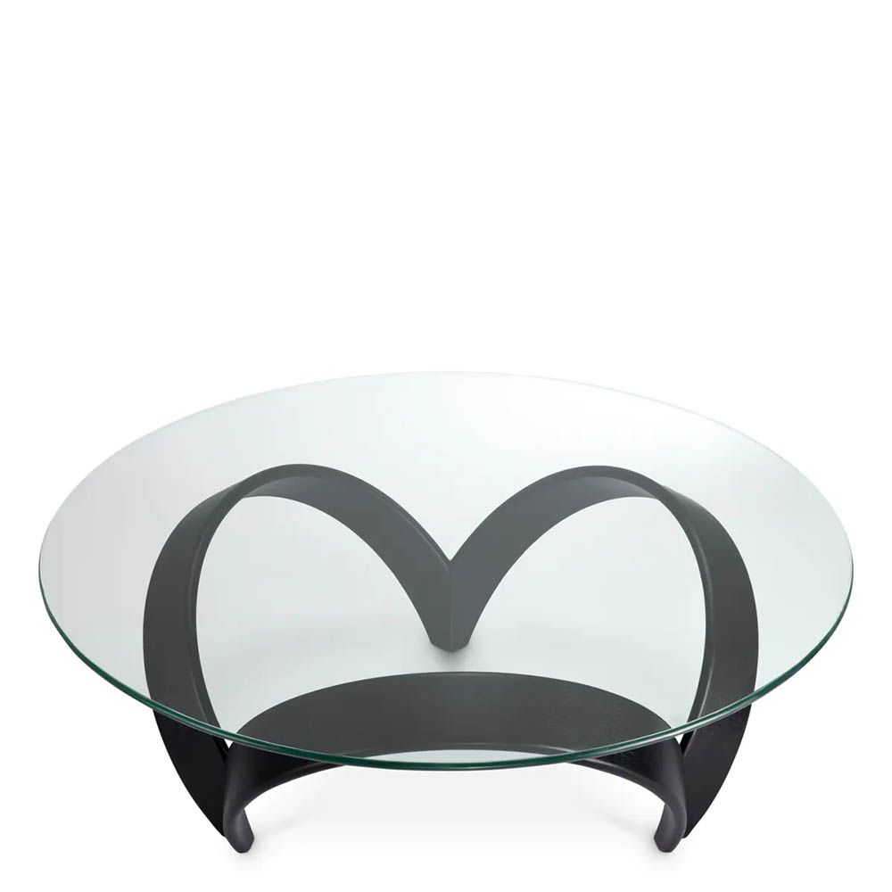 Curvaceous trio legged coffee table with round glass top