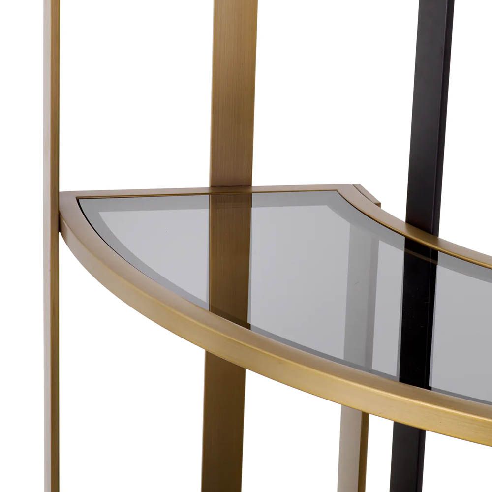 Contemporary corner cabinet with shelves finished in brushed brass