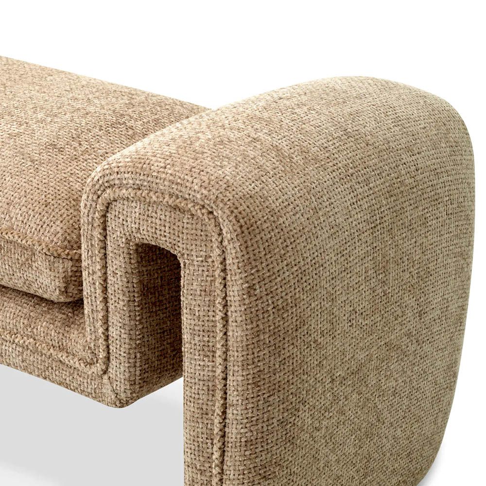 A modern bench by Eichholtz with a stunning sand coloured upholstery