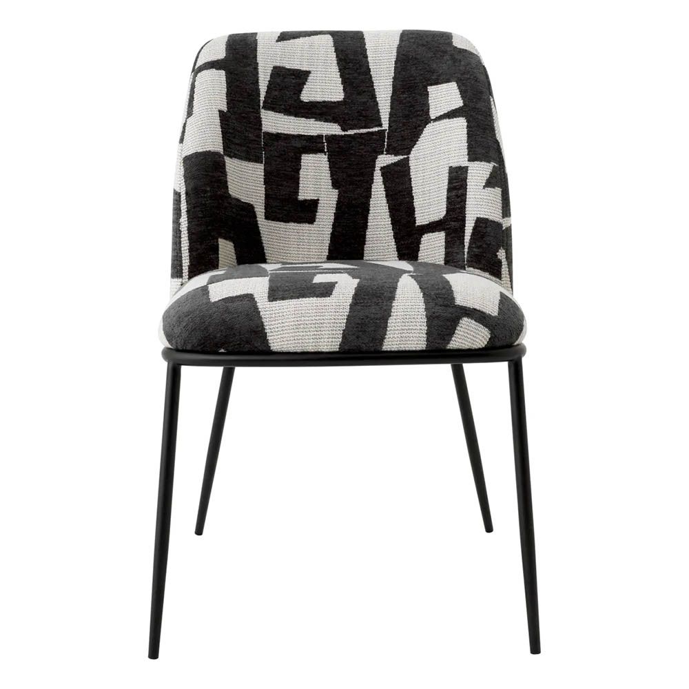 Dining chair with black and white abstract design and black legs