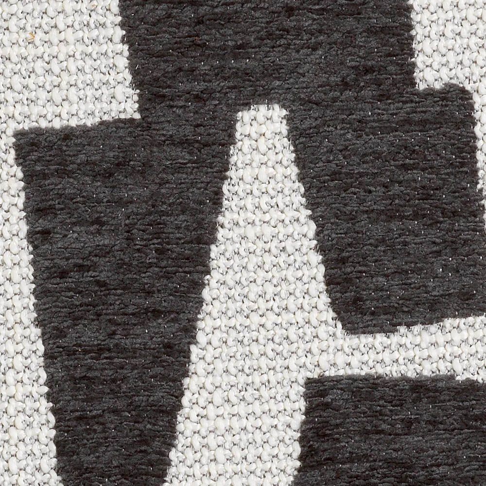Dining chair with black and white abstract design and black legs
