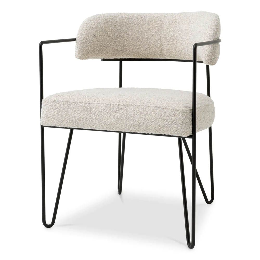 Dining chair with black frame and cream boucle seat and back pads