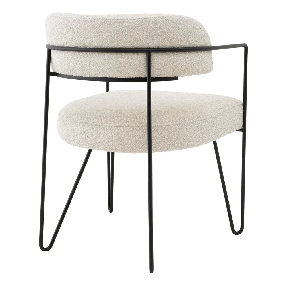 Dining chair with black frame and cream boucle seat and back pads
