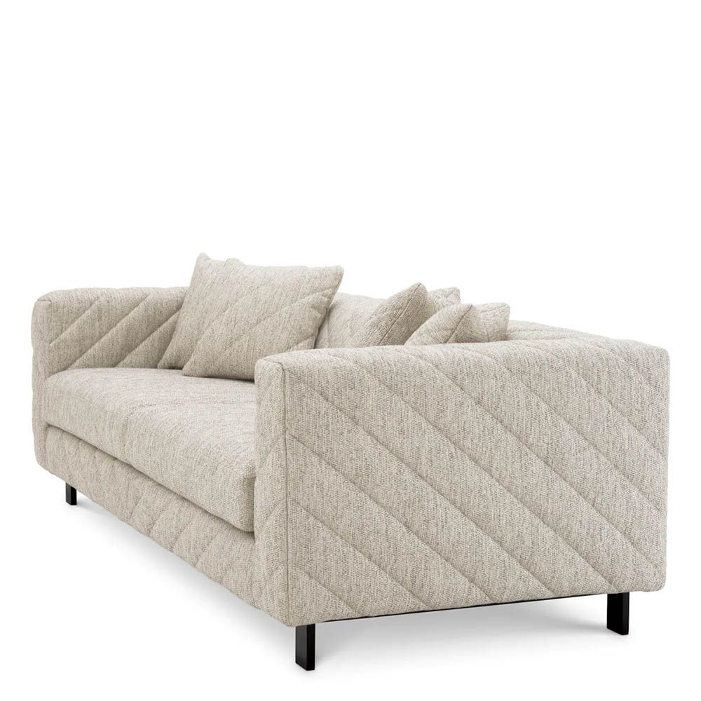 Sumptuous grey upholstered modern sofa with chevron stitching detail