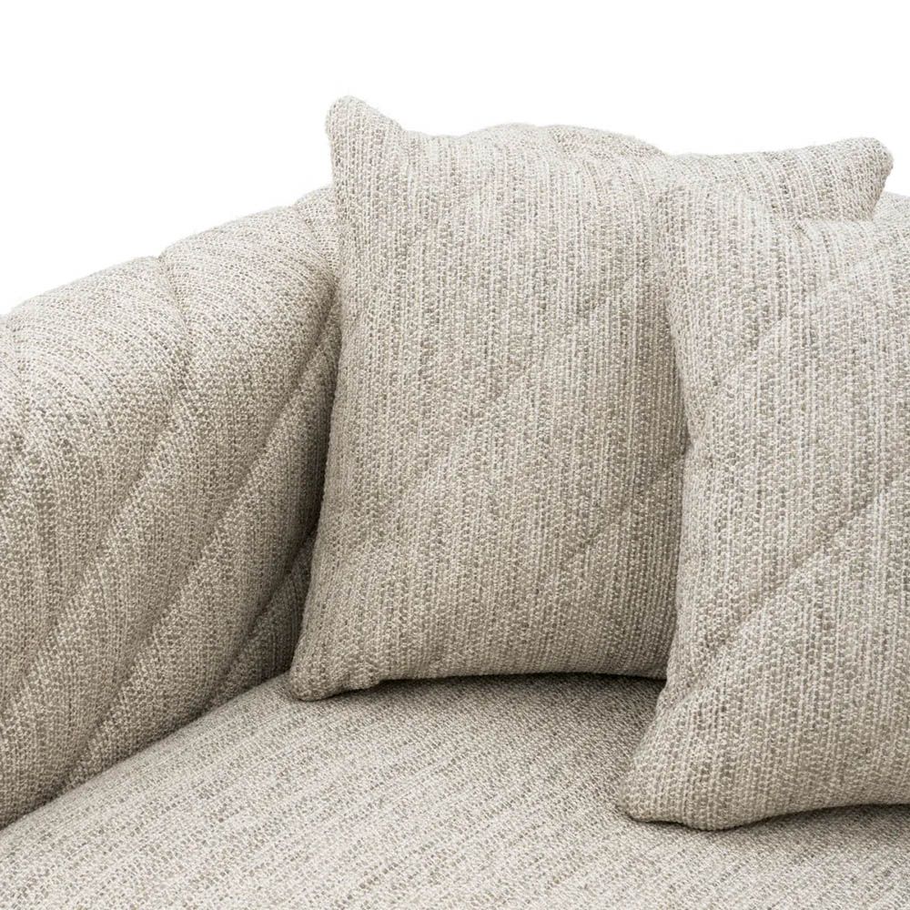 Sumptuous grey upholstered modern sofa with chevron stitching detail